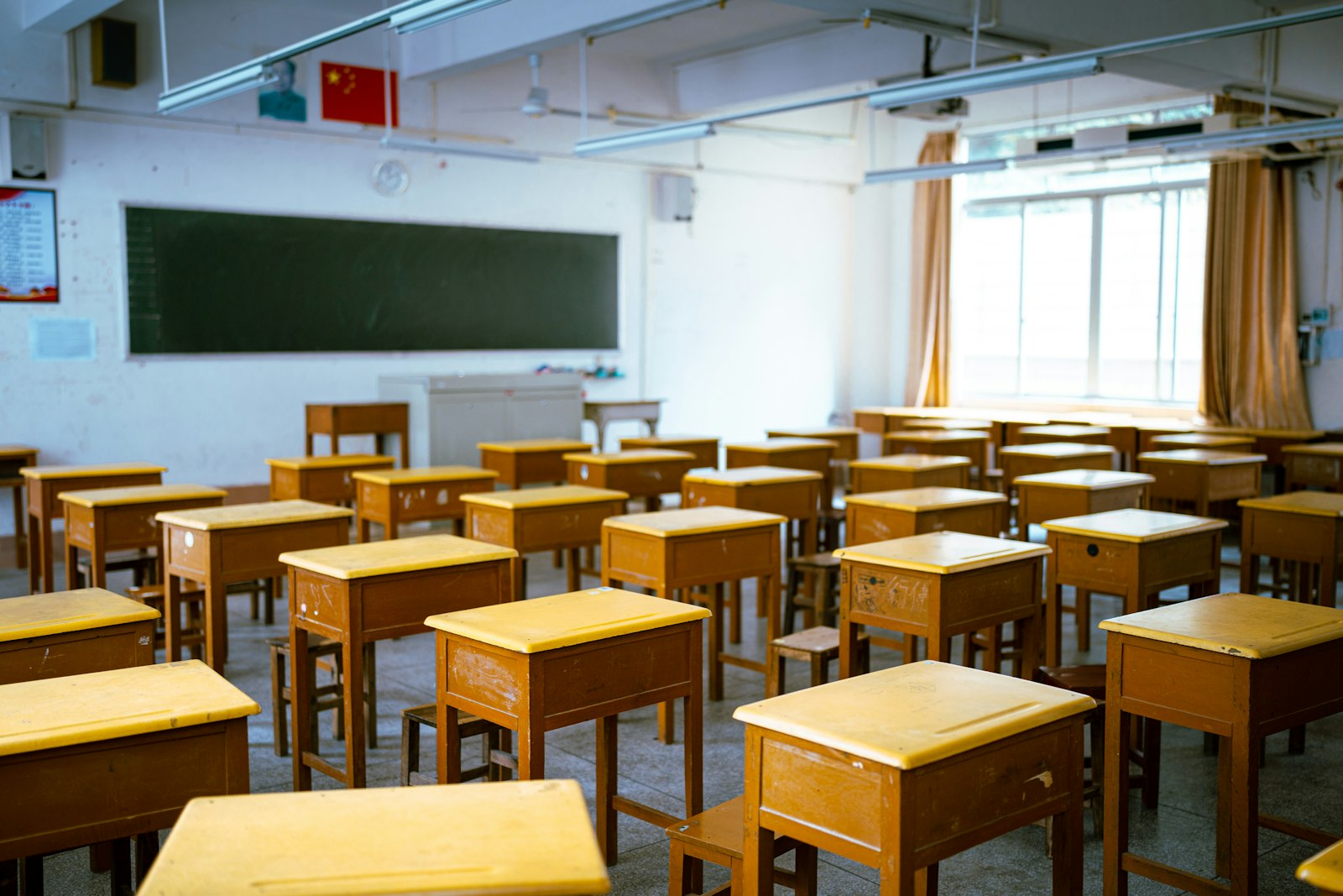 Empty desks in a classroom